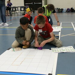 Students working on a robotics exercise