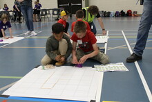 Students working on a robotics exercise
