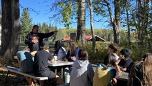 Indigenous knowledge keeper sharing with students