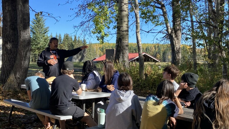Indigenous knowledge keeper sharing with students