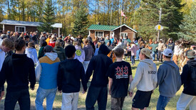 Students participating in a round dance